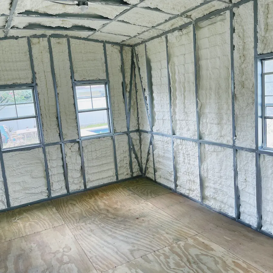 Closed-cell spray foam insulation applied to wall cavities in a residential project in Mentor